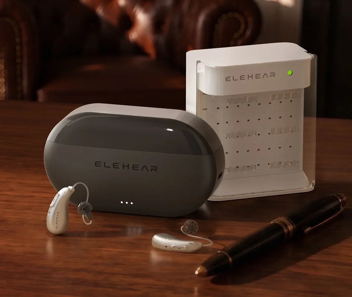 Elehear rechargeable hearing aids with charging case and drying box on wooden table