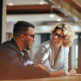 business_professionals_conversation_hearing_aids thumbnail